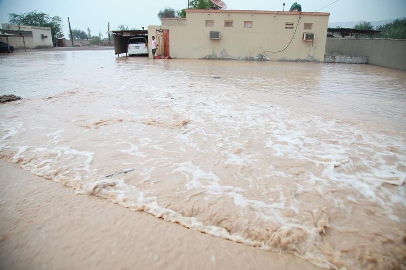 Rain in Sham and Wadi Ghalilah in RAK caused flooding in mountainous areas. Residents said the last time they saw floods was 1975. Mariam Al Nuaimi / The National