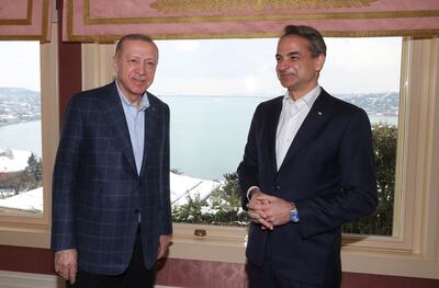 Greek Prime Minister Kyriakos Mitsotakis, right, talks to Turkish President Recep Tayyip Erdogan during their meeting in Istanbul in March. AP Photo