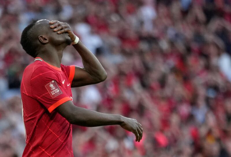 Sadio Mane reacts after missing his penalty. AP