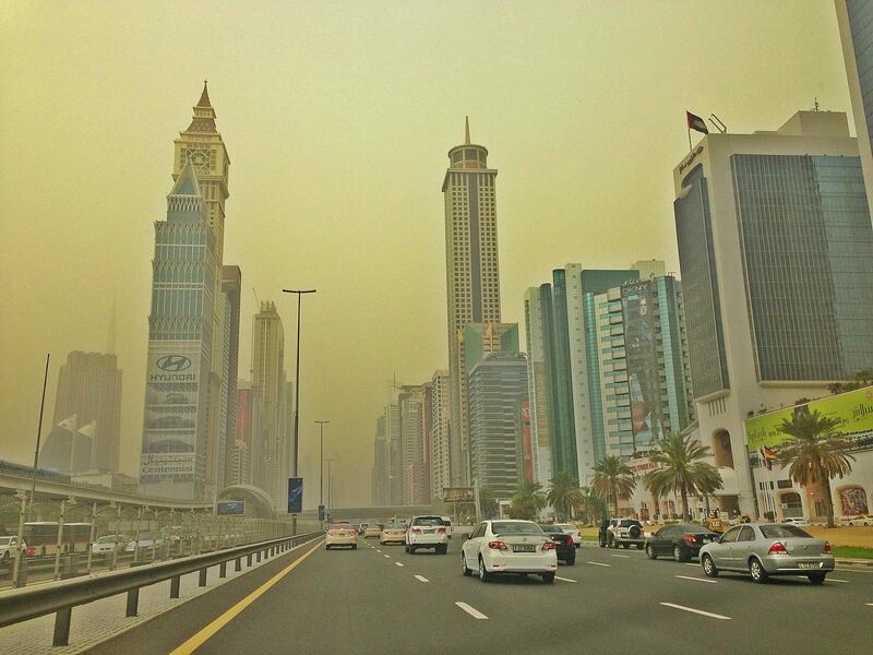 Sheikh Zayed Road glows golden in Dubai. Photo by Jad Rajab
