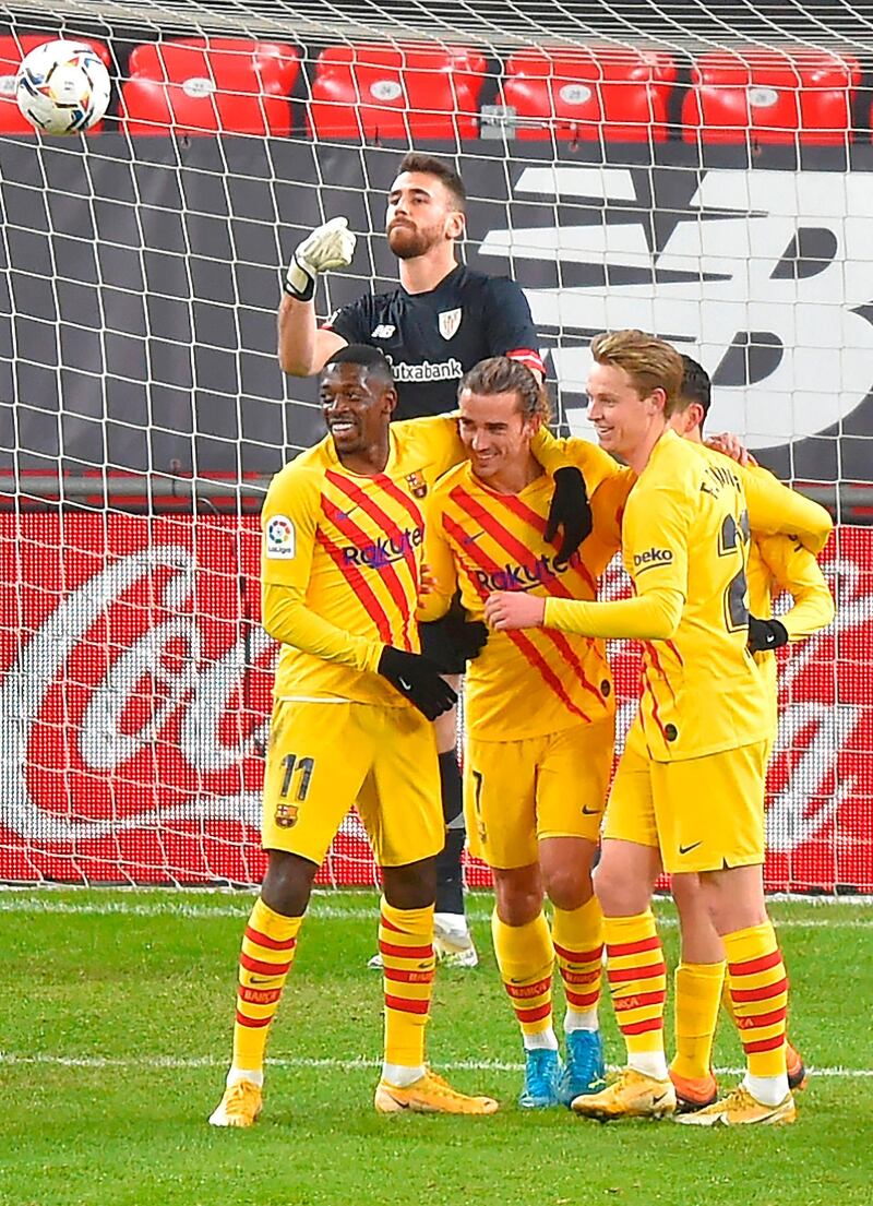 Left to right: Barcelona's Antoine Griezmann, Ousmane Dembele, Pedri and Frenkie De Jong celebrate their team's goal. AFP