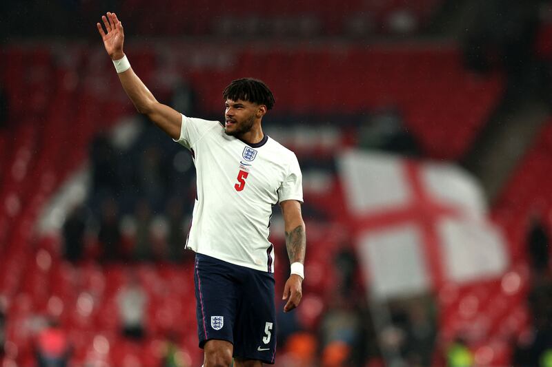 Mings waves to supporters after the match. AFP