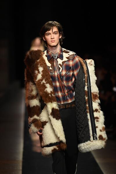 MILAN, ITALY - JANUARY 14:  A model walks the runway at the Dsquared2 show during Milan Men's Fashion Week Fall/Winter 2018/19 on January 14, 2018 in Milan, Italy.  (Photo by Venturelli/WireImage/Getty Images)