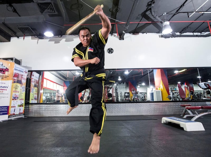 Dubai UNITED ARAB EMIRATES - Guro Omar , a Filipino eskrima giving instructions to his students at Power Gym in Dubai.  Ruel Pableo for The National for Nick's story