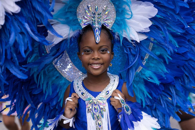 A young performer in the procession. Getty