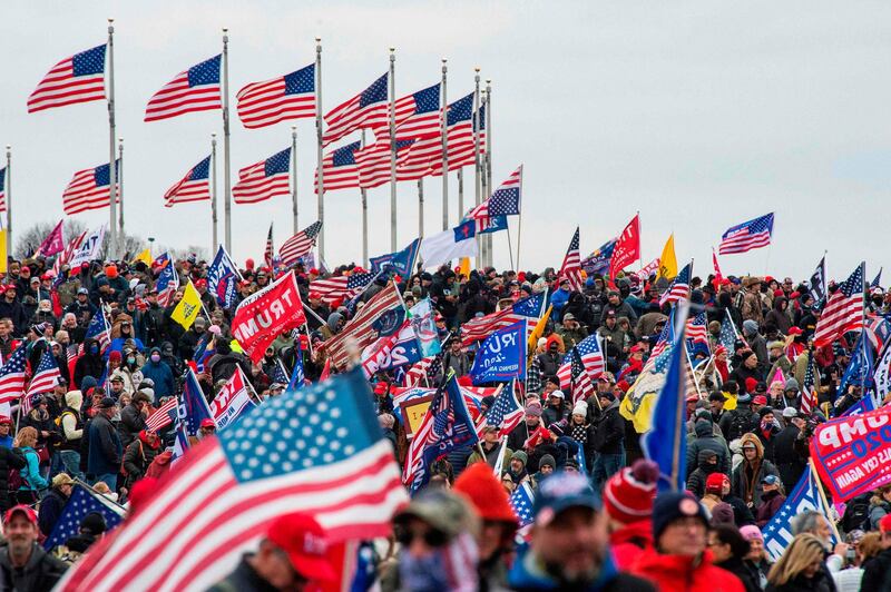 Thousands of supporters for US President Trump pack the Washington Mall for a rally in Washington, DC as a total of six buses and about 300 people followed by AFP took part in the Super Fun Happy America journey to Washington, DC, from Boston to take part in the protest and rallies in the district. AFP