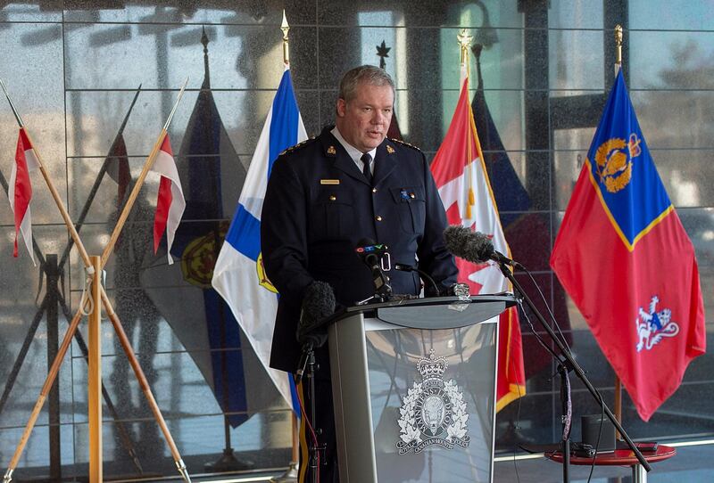 Royal Canadian Mounted Police Chief Superintendent Chris Leather fields questions at a news conference at RCMP headquarters in Dartmouth, Nova Scotia.  AP