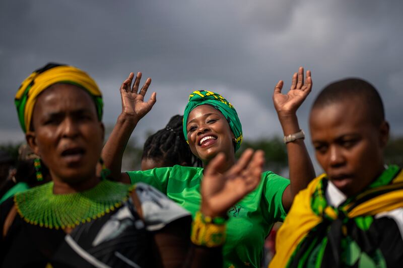 Supporters of the uMkhonto we Sizwe party dance during a campaign rally in Mpumalanga, near Durban, ahead of South Africa's general election. AP