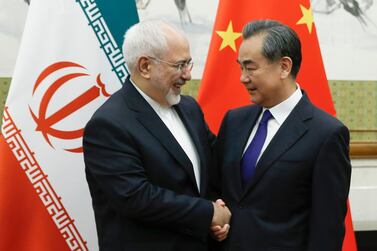 Chinese Foreign Minister Wang Yi during his 2018 meeting with Iranian counterpart Mohammad Javad Zarif in Beijing. Both countries are expected to unveil a pact soon. EPA