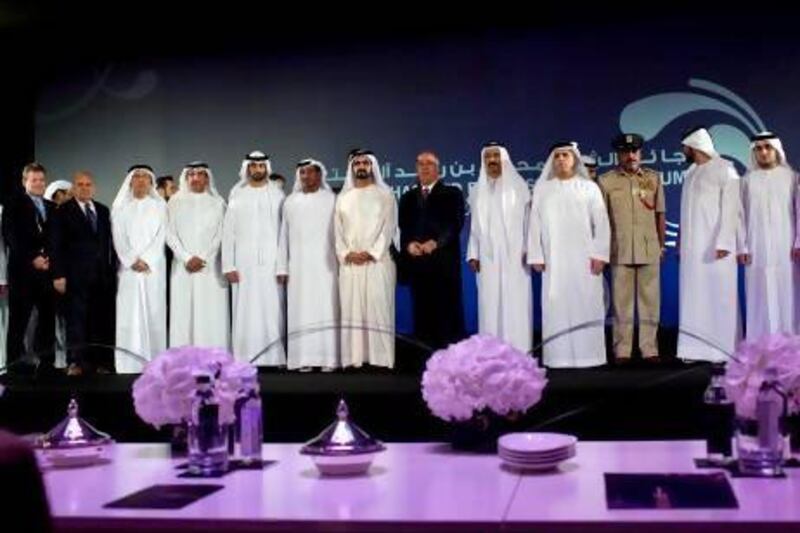Sheikh Mohammed bin Rashid, Vice President of the UAE and Ruler of Dubai, with recipients of the fourth Sheikh Mohammed bin Rashid Al Maktoum Patrons of the Arts Awards yesterday. The 40 recipients contributed more than Dh170 million to the arts scene in 2012. Christopher Pike / The National
