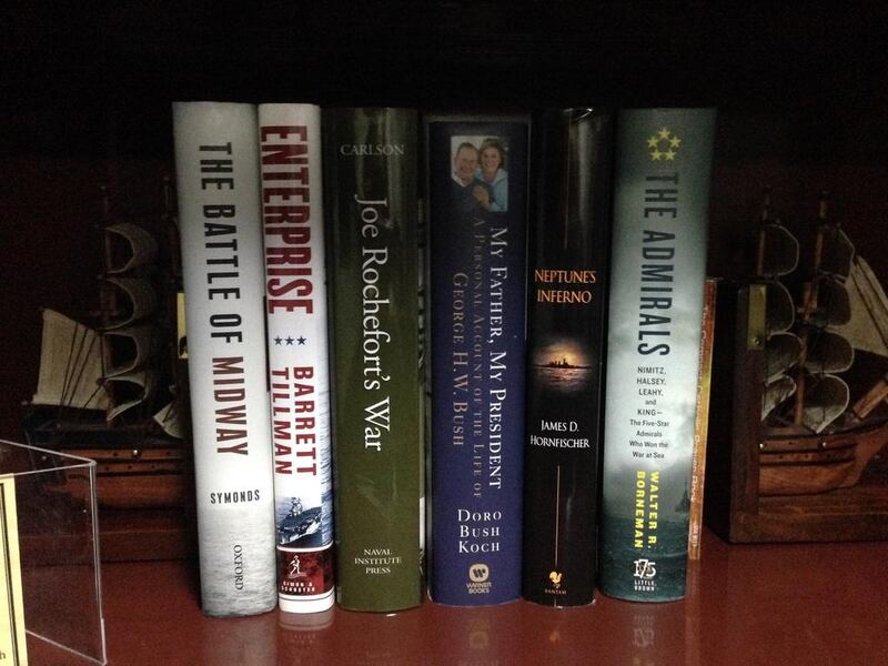 The bookshelf in the United Nations suite aboard the USS George HW Bush aircraft carrier.