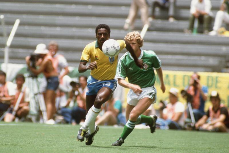 Brazil's Josimar under pressure from Jimmy Nichol of Northern Ireland during the 1986 World Cup in Mexico. Getty