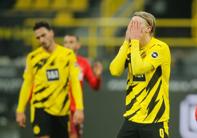 Borussia Dortmund's Erling Braut Haaland cannot bare to look after after missing a chance to score during their surprise 2-1 Dundesliga 
defeat at home to Cologne on Saturday, November 28. Reuters