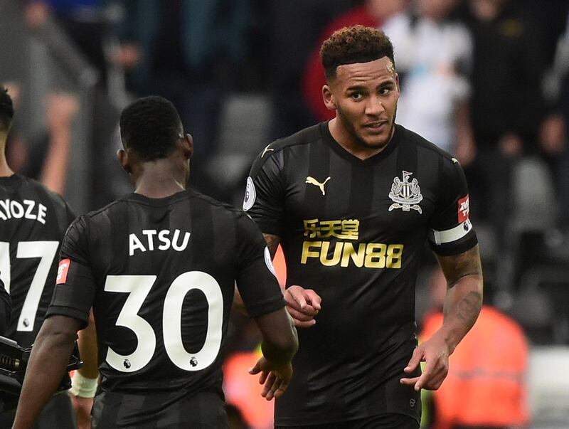 Soccer Football - Premier League - Swansea City vs Newcastle United - Swansea, Britain - September 10, 2017   Newcastle United���s Jamaal Lascelles celebrates victory   REUTERS/Rebecca Naden    No use with unauthorized audio, video, data, fixture lists, club/league logos or "live" services. Online in-match use limited to 75 images, no video emulation. No use in betting, games or single club/league/player publications.  Please contact your account representative for further details.