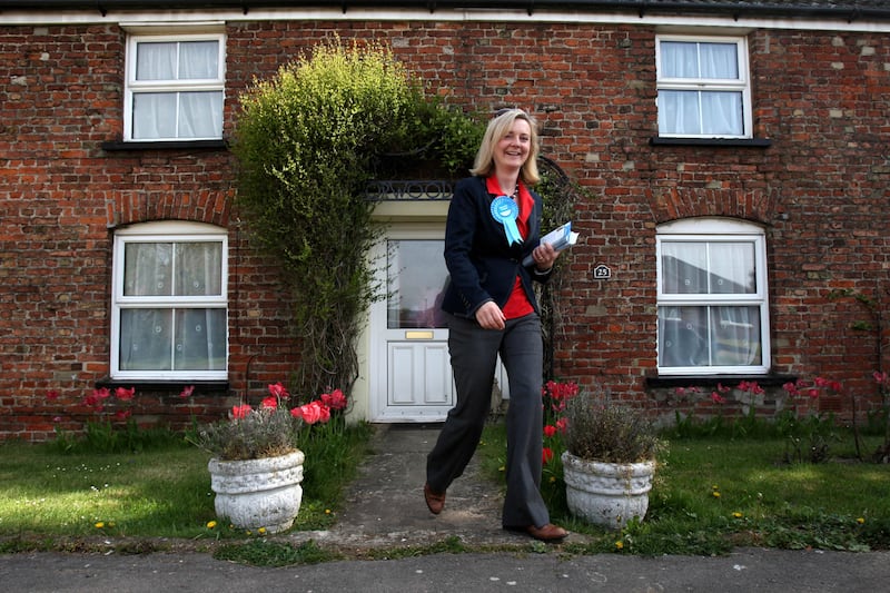 Conservative Parliamentary candidate for South-West Norfolk Elizabeth Truss, while canvassing in the village of West Walton during the 2010 General Election campaign.  PA