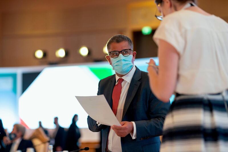 Alok Sharma, President of Cop26, at the event in Abu Dhabi. 'We all need to act with urgency to address climate change,' said Mr Sharma.