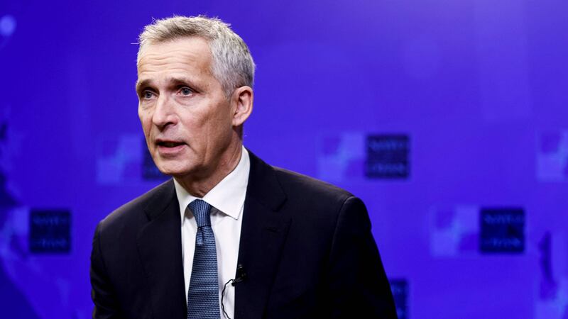 NATO Secretary General Jens Stoltenberg gestures as he speaks during an AFP interview at the NATO headquarters in Brussel, on December 16, 2022.  (Photo by Kenzo TRIBOUILLARD  /  AFP)