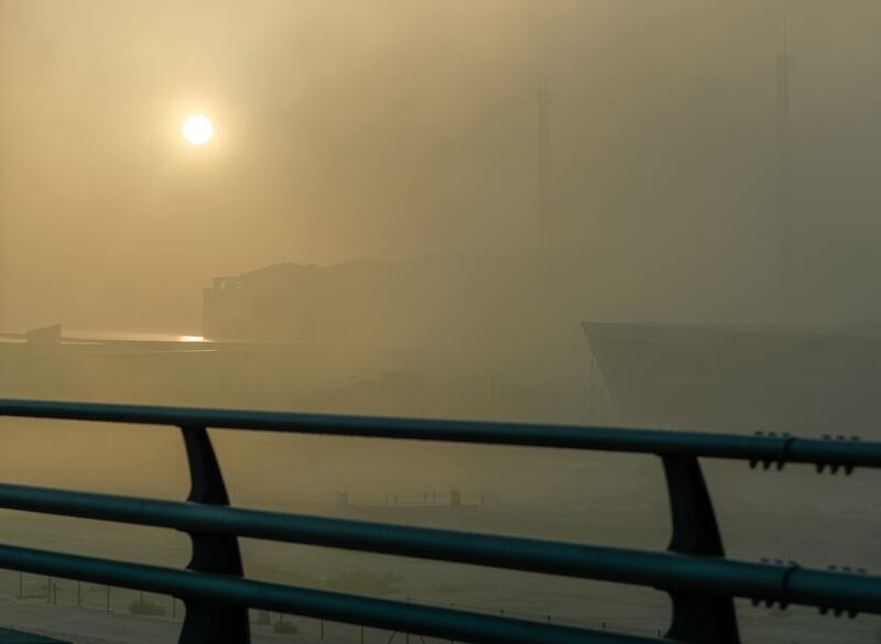 Fog descending on Abu Dhabi. All photos: Victor Besa / The National