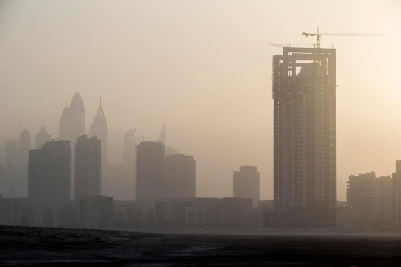 DUBAI, UNITED ARAB EMIRATES, 10 MAY 2017. Standalone photo. As summer temperatures rise visibility drops in the UAE as seen in the dusty sunset over Al Barsha Heights and the Greens. Today saw a heat index of 41 degrees with humidity of 60% while visibility was limited to 4km's. (Photo: Antonie Robertson/The National) ID: STANDALONE. Journalist: None. Section: National. *** Local Caption ***  AR_1005_Standalone_Weather-06.JPG