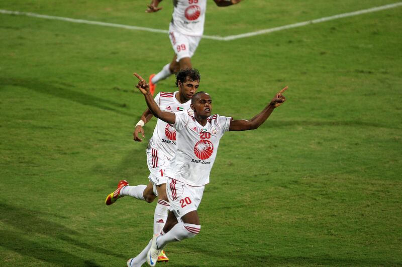 DUBAI , UNITED ARAB EMIRATES Ð Sep 14 :  Marcelo ( no 20 in white ) of Sharjah after scoring the goal against Emirates in the Pro League round robin tournament football match between Sharjah vs Emirates at Al Shabab stadium in Dubai. ( Pawan Singh / The National ) For Sports. Story by Ahmed