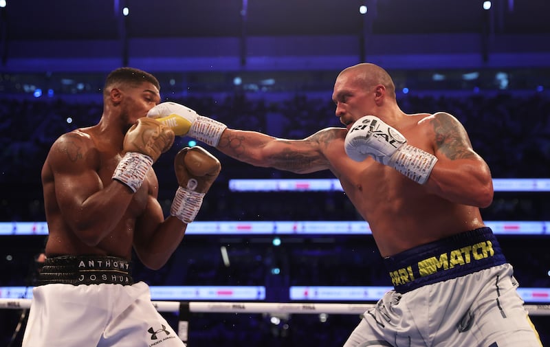 Oleksandr Usyk punches Anthony Joshua. Getty