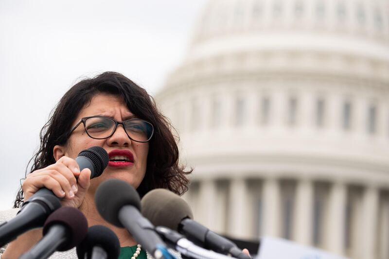 (FILES) In this file photo taken on May 09, 2019 US Representative Rashida Tlaib, Democrat of Michigan, speaks during a press conference after receiving a computer flash drive from activist at the US Capitol in Washington, DC, May 9, 2019. US President Donald Trump on May 13, 2019 entered the swirling debate over a US Congresswoman's comments regarding the Holocaust that Republicans have condemned as anti-Semitic. The uproar began last week when Rashida Tlaib, a freshman congresswoman in the House of Representatives whose parents are Palestinian immigrants, said in an interview that she finds "a kind of calming feeling," in the fact that Palestinians were involved in creating "a safe haven for Jews." / AFP / SAUL LOEB
