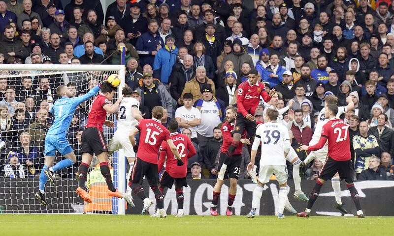 Manchester United's Harry Maguire and goalkeeper David de Gea attempt to clear the ball. PA