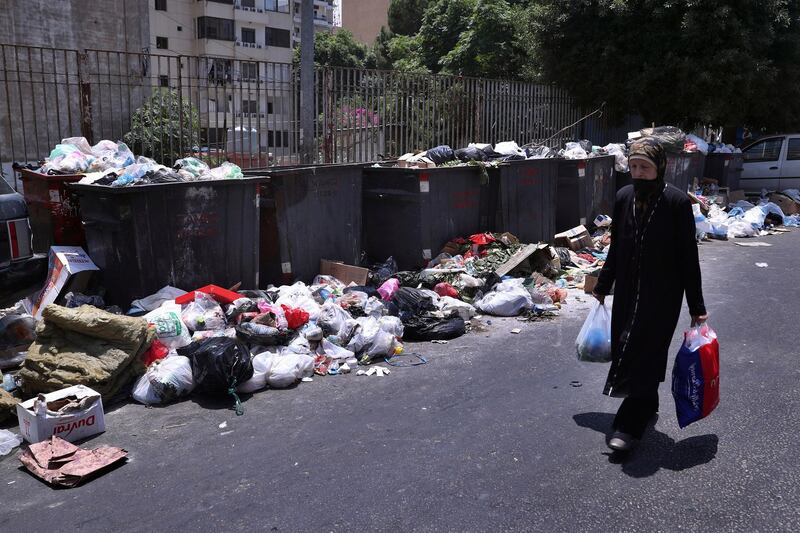 The piles of rubbish brought back memories of a previous waste disposal crisis that sparked large anti-government demonstrations in 2015. AP Photo