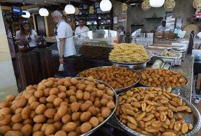 The al-Rabat Sweets and Bakery, founded by Iraqi immigrants in the UAE, is pictured during the Muslim holy month of Ramadan, in Sharjah on May 28, 2019.  / AFP / KARIM SAHIB
