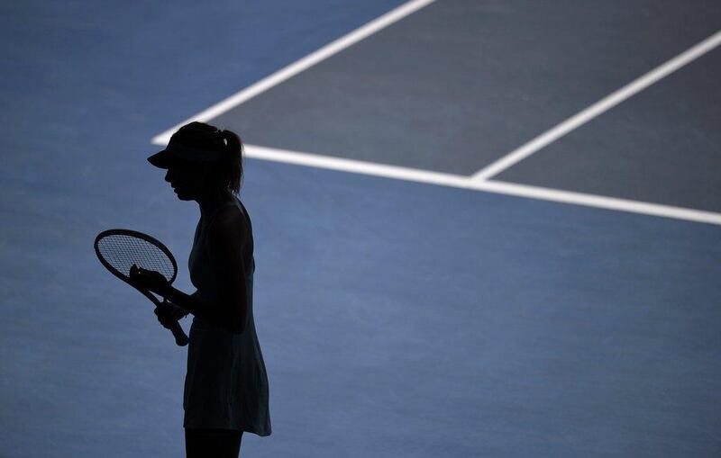 Maria Sharapova shown silhouetted at the Australian Open in January 2014. Franck Robichon / EPA