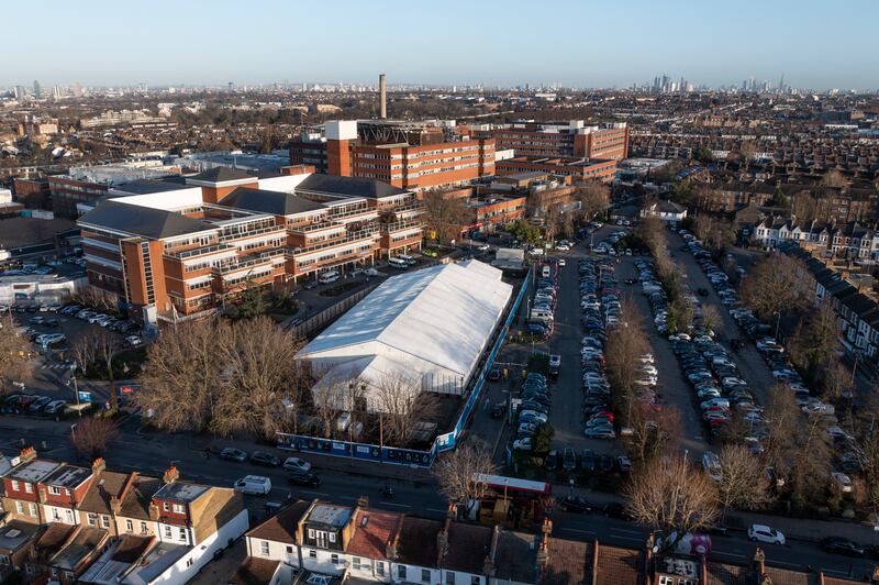 A new 'Nightingale' hub was set up in the grounds of St Georges Hospital on Wednesday in London. NHS Nightingale Surge Hubs are being set up in eight English hospitals in preparation for a possible increase in patient admissions due to the Omicron variant. Getty Images