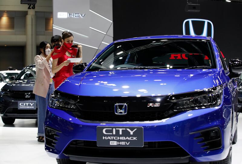 Honda will stop exports of cars and motorcycles to Russia.   EPA