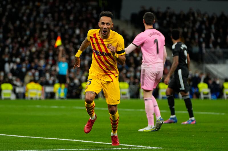 Pierre-Emerick Aubameyang celebrates after scoring Barcelona's fourth goal against Real Madrid. AP