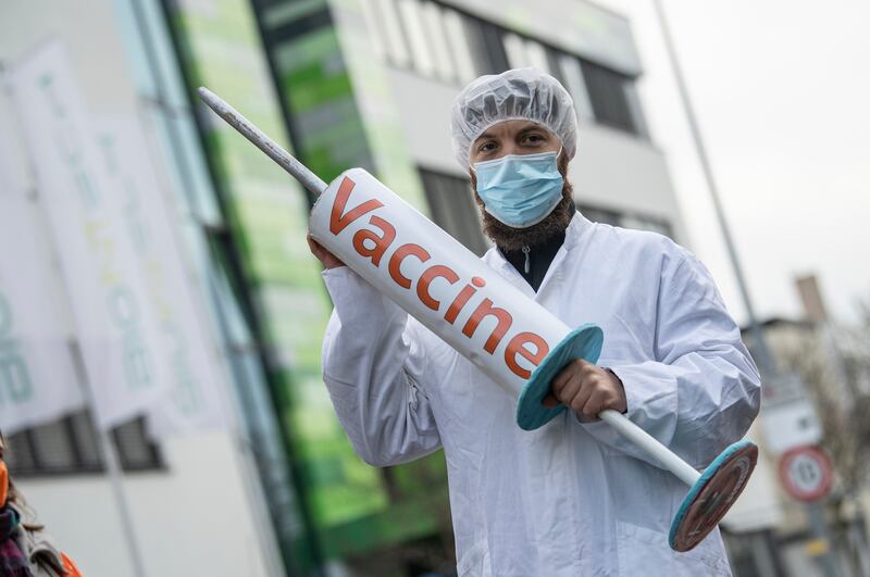 Activists demonstrate in front of the BioNTech headquarters in Mainz, Germany. AP Photo