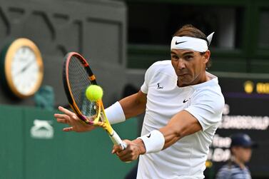 Spain's Rafael Nadal returns the ball to Netherlands' Botic van de Zandschulp during their round of 16 men's singles tennis match on the eighth day of the 2022 Wimbledon Championships at The All England Tennis Club in Wimbledon, southwest London, on July 4, 2022.  (Photo by Glyn KIRK  /  AFP)  /  RESTRICTED TO EDITORIAL USE