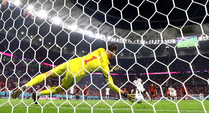 Canada's Alphonso Davies has his penalty saved by Belgium's Thibaut Courtois. Reuters