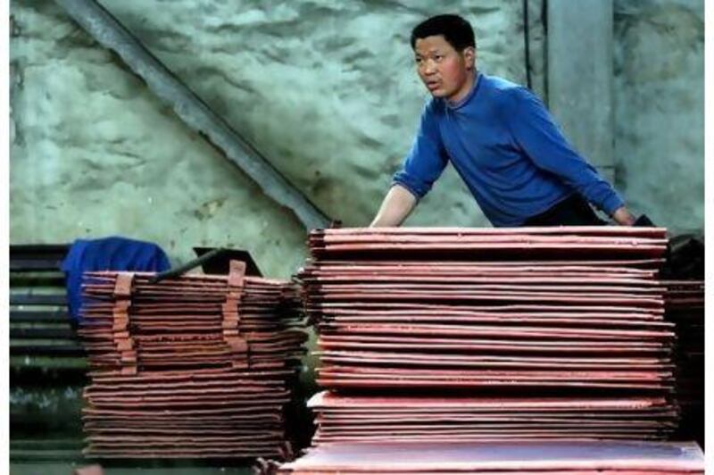 A worker at a copper smelter in China. The country is the world's biggest copper user. Natalie Behring / Bloomberg