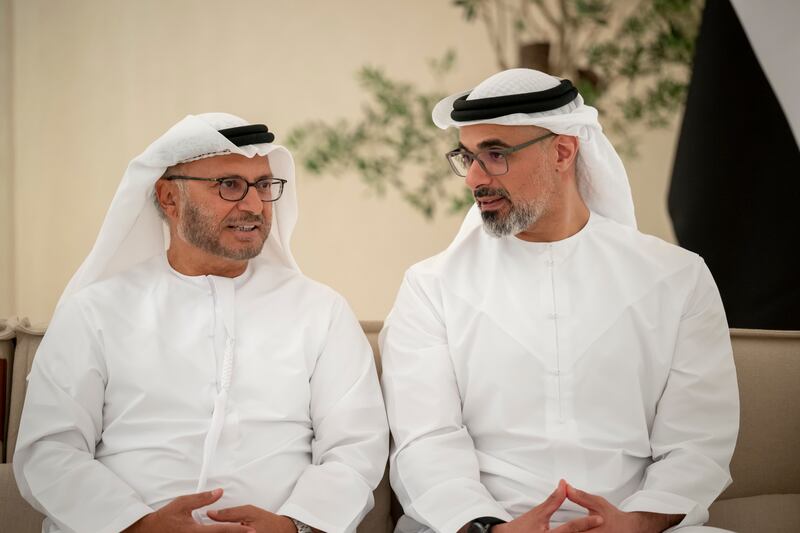 Sheikh Khaled bin Mohamed, member of the Abu Dhabi Executive Council and chairman of the Abu Dhabi Executive Office, and Dr Anwar Gargash, diplomatic adviser to the President, attend the reception