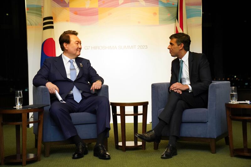 Yoon Suk Yeol, President of South Korea, left, and British Prime Minister Rishi Sunak during their meeting at the G7 Summit in Hiroshima, Japan. AP