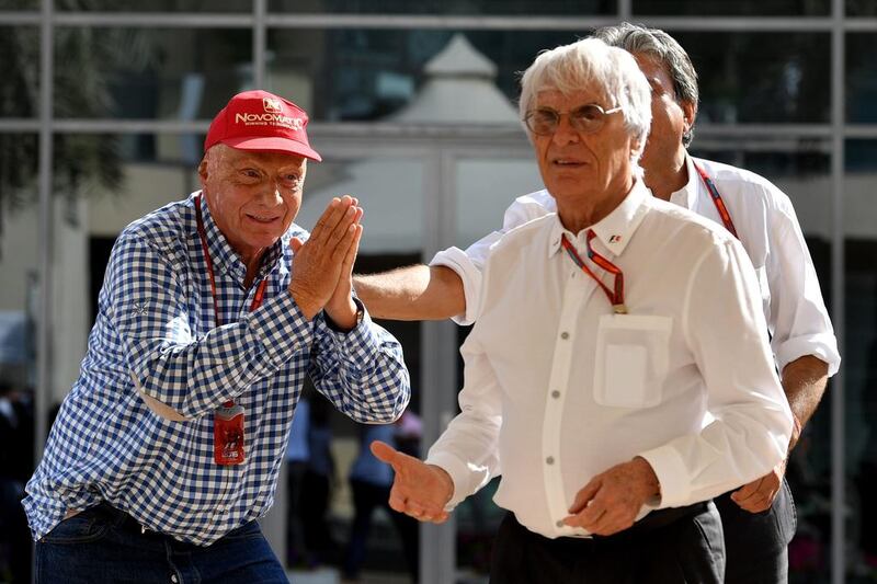 Mercedes non-executive chairman and former multiple world driver champion, Niki Lauda, left, and F1 chief Bernie Ecclestone have fun ahead of the start of the race. Andrej Isakovic / AFP Photo