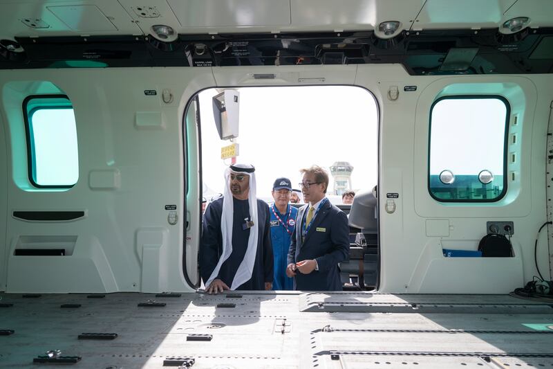President Sheikh Mohamed inspects the interior of an aircraft on display. Mohamed Al Hammadi / UAE Presidential Court