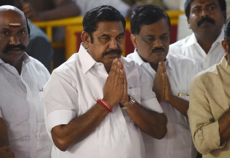 AIADMK party leader Edappadi Palanisamy pays his respects at the memorial for former state chief minister Jayalalithaa Jayaram after being sworn in as the chief minister of the state of Tamil Nadu in Chennai. Indian legislators came to blows February 18, ripping out microphones and breaking chairs as the new leader of Tamil Nadu state sought to win a vote of confidence in the regional assembly. AFP / ARUN SANKAR

