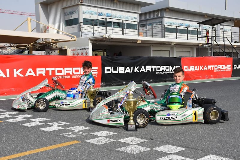 Brothers Jakob, left, and Lachlan Robinson are finding success on the karting scene in the UAE. Courtesy Total Communications