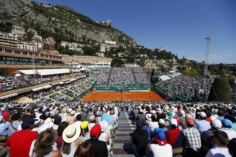 A general view of the court shows Spain’s Rafael Nadal (R) and Britain’s Andy Murray competing during their semi-final tennis match at the Monte-Carlo ATP Masters Series Tournament in Monaco on April 16, 2016. AFP PHOTO / VALERY HACHE