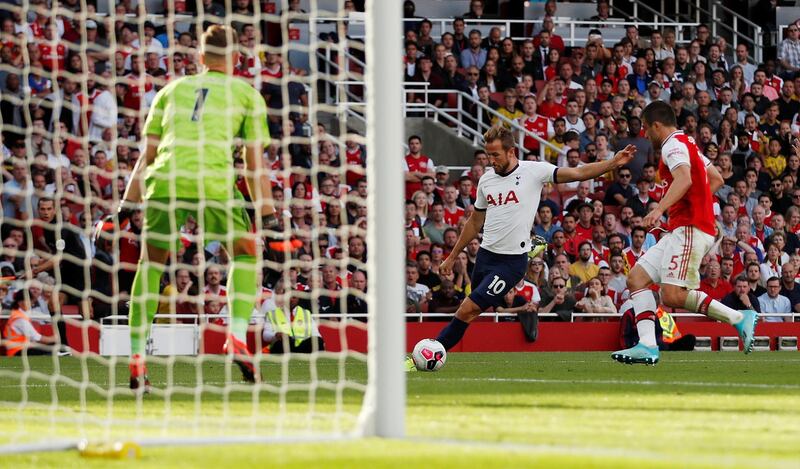 Tottenham Hotspur's Harry Kane takes a shot that hits the post. Reuters