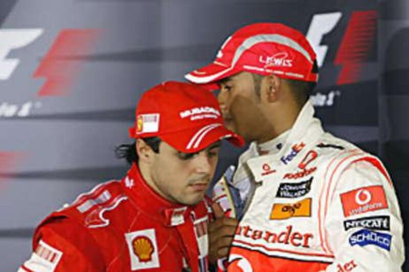 Lewis Hamilton, right, holds a seven point lead over Felipe Massa going into the Brazilian GP. The McLaren driver squandered an identical lead last year when losing out to Kimi Raikkonen.