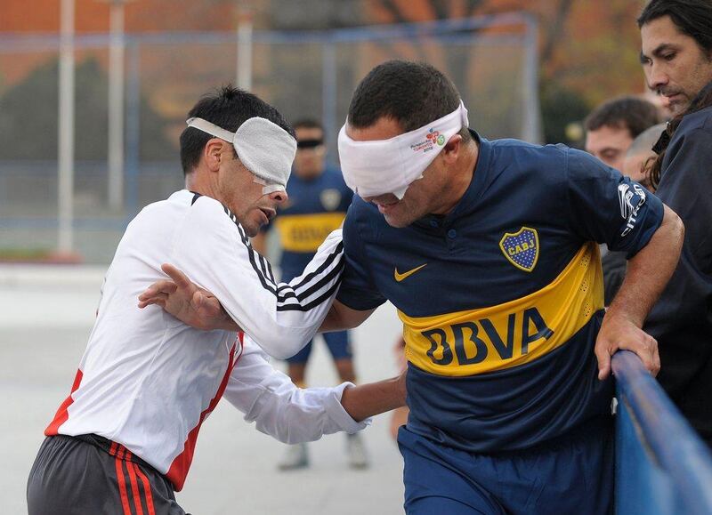 Silvio Velo, right, in action for Boca Juniors against rivals River Plate. Velo played for River for a decade before moving to his boyhood club. Alejandro Pagni / AFP