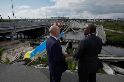 David Lammy and shadow defence secretary John Healey survey a destroyed bridge in Irpin, amid Russia's attack on Ukraine. Reuters