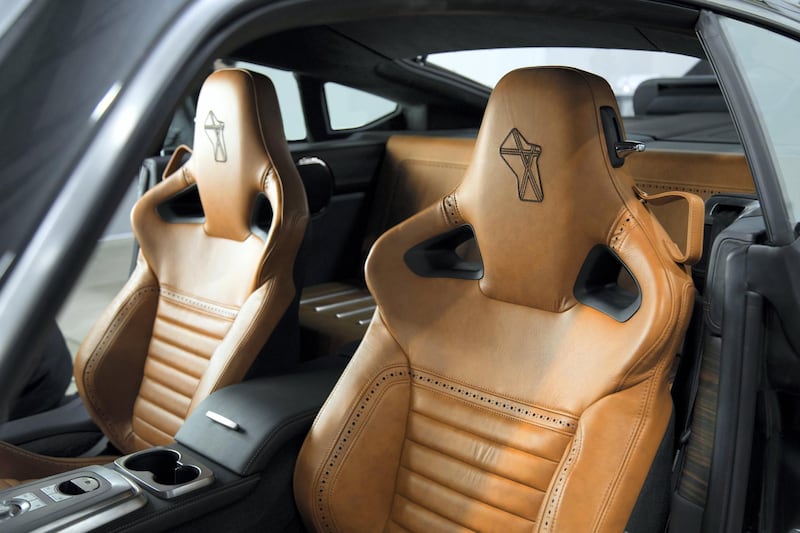 The interior is dominated by leather and brusher aluminium. David Brown Automotive