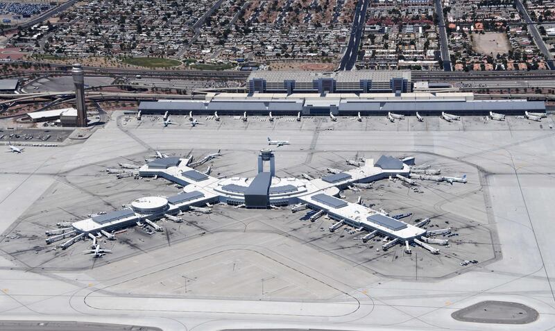 An aerial view shows the air traffic control tower and terminal 3 at McCarran International Airport amid the spread of the coronavirus in Las Vegas, Nevada. AFP